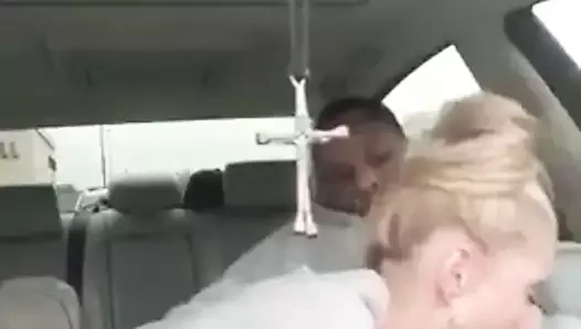 Mature Blonde expertly services BBC in car’s backseat.