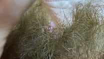 Tantalizing hairy Milf’s close-up, cuming from clit rubbing.